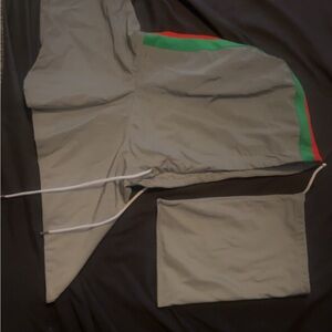 Gucci unisex reflective hood.